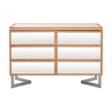 A modern six-drawer chest featuring a sleek design with a light wood finish and white drawer fronts. The chest is supported by stylish silver metal legs, providing a contemporary look suitable for various home decor styles