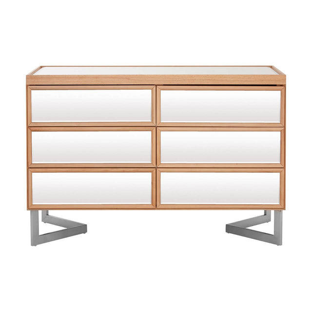A modern six-drawer chest featuring a sleek design with a light wood finish and white drawer fronts. The chest is supported by stylish silver metal legs, providing a contemporary look suitable for various home decor styles