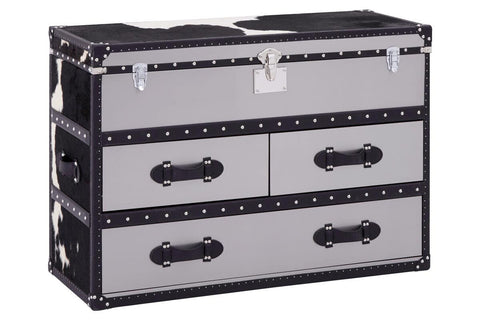 Black and white hair-on-leather cabinet featuring three spacious drawers with decorative handles, set against a sleek black frame. The cabinet has a modern design with a stylish finish, suitable for home decor