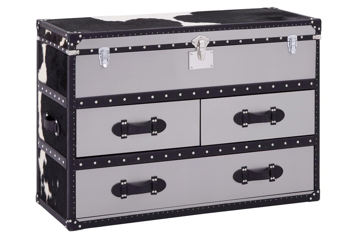 Black and white hair-on-leather cabinet featuring three spacious drawers with decorative handles, set against a sleek black frame. The cabinet has a modern design with a stylish finish, suitable for home decor
