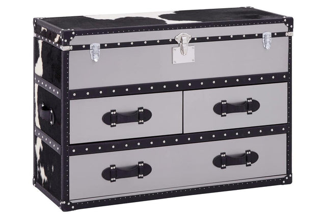 Black and white hair-on-leather cabinet featuring three spacious drawers with decorative handles, set against a sleek black frame. The cabinet has a modern design with a stylish finish, suitable for home decor