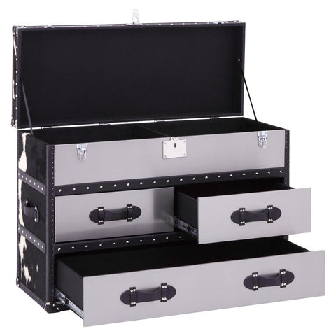 Black and white hair-on leather cabinet featuring three spacious drawers with stylish handles, a sleek design, and a top compartment that opens for additional storage. The cabinet is set against a neutral background, highlighting its modern aesthetic