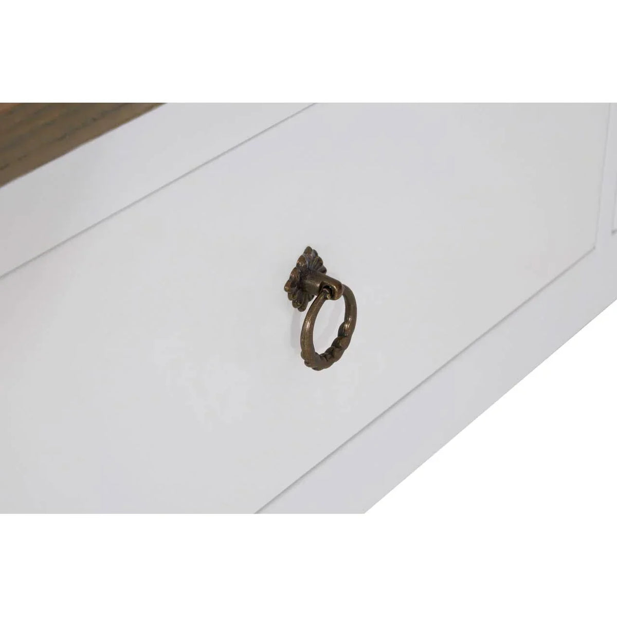 White wooden drawer with antique brass ring handle and panel detailing
