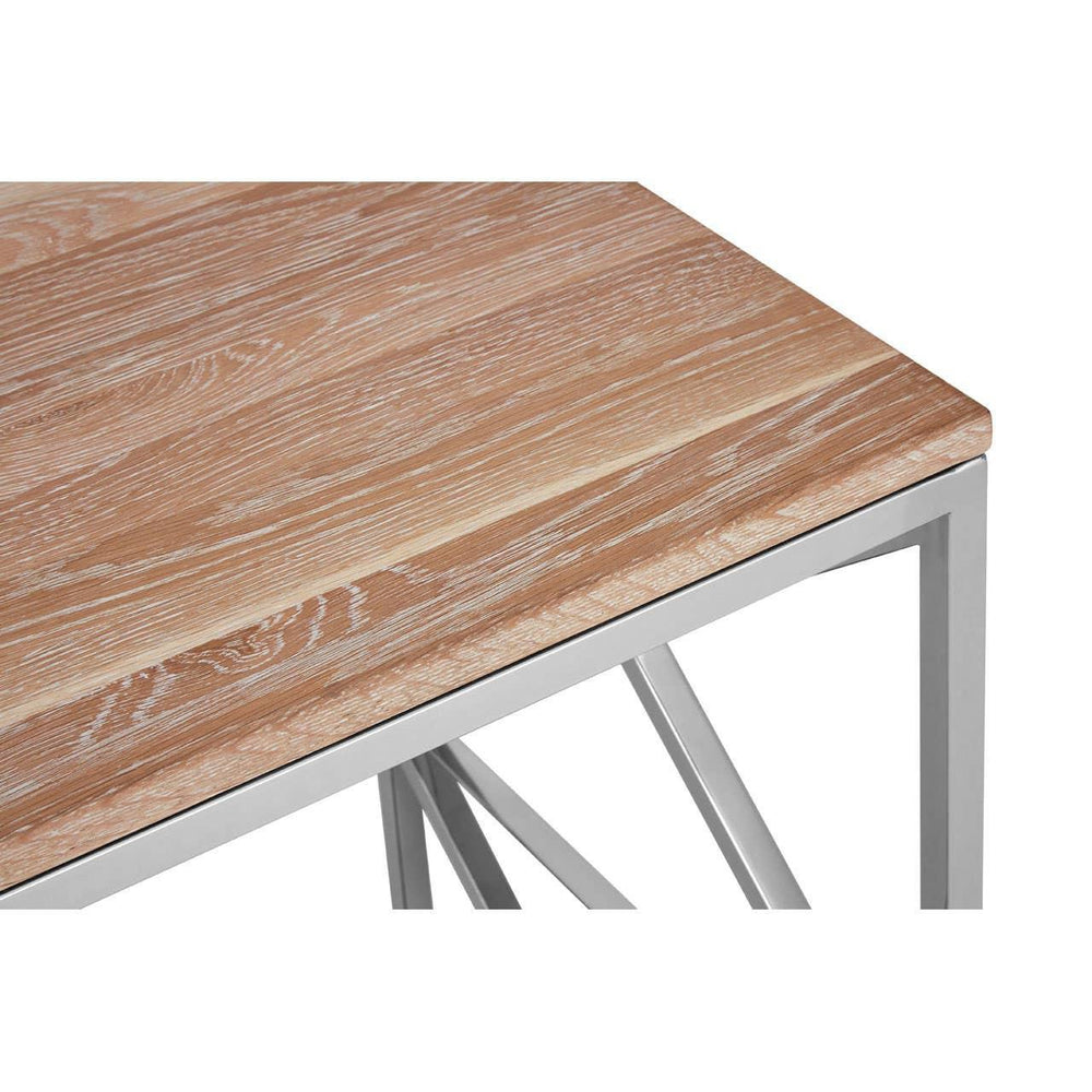 Light wood dining table with metal frame, angled corner view showing natural wood grain