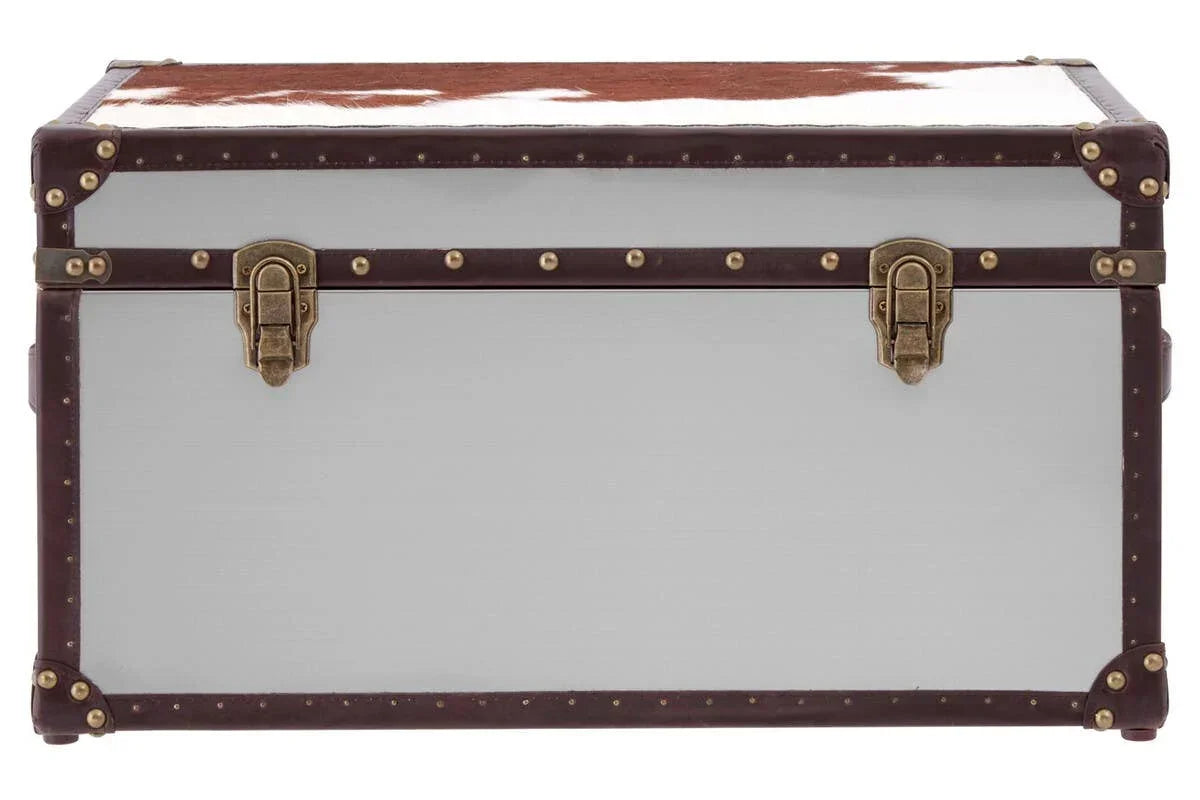 Storage trunk with white panels, brown leather trim, brass latches and cowhide lid detail