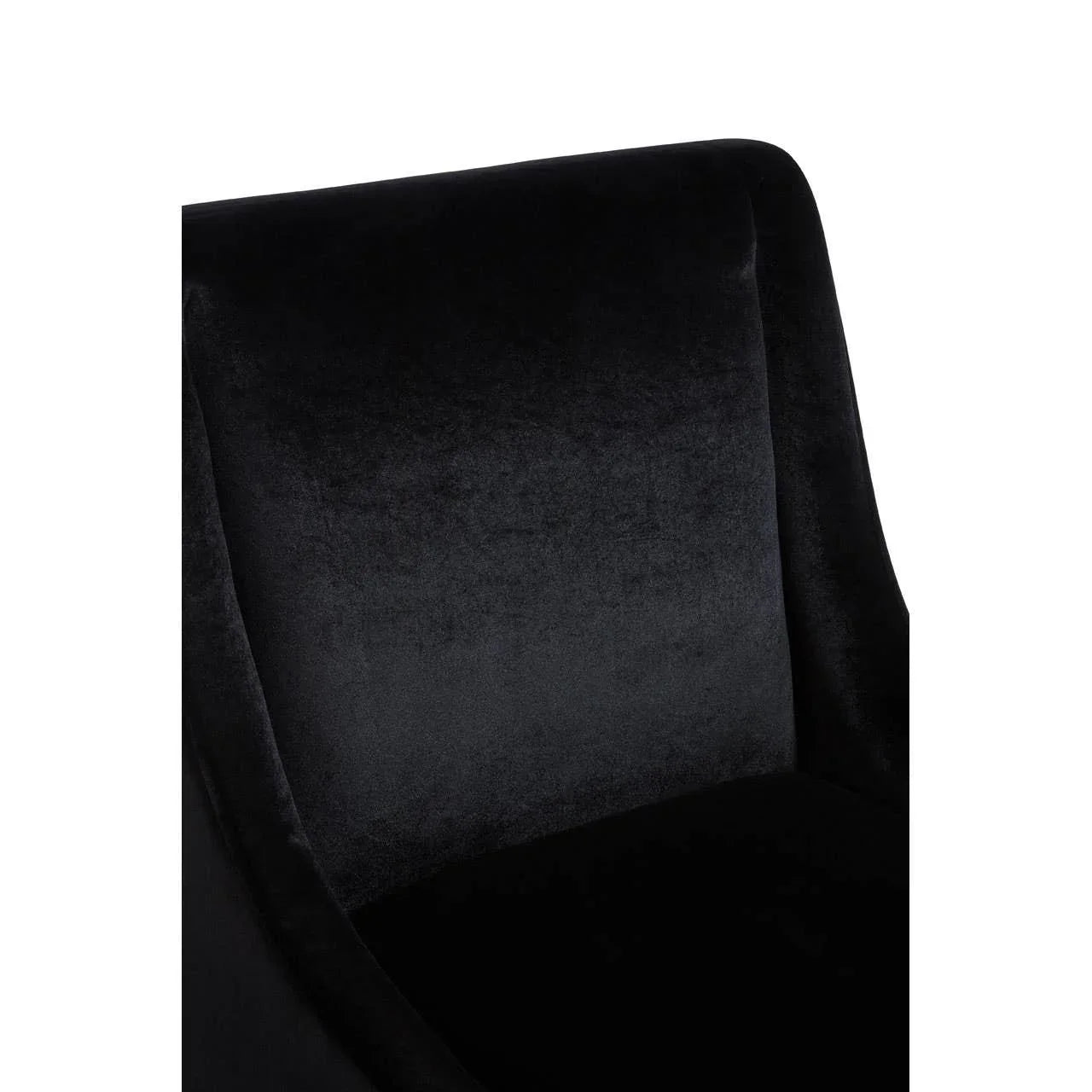 Close-up of black velvet armchair backrest and seat upholstery