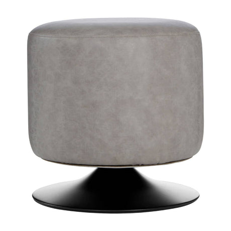 A round pouffe upholstered in ash grey faux leather, featuring a smooth, rounded top and a sleek black base. The design is modern and minimalist, suitable for various home decor styles