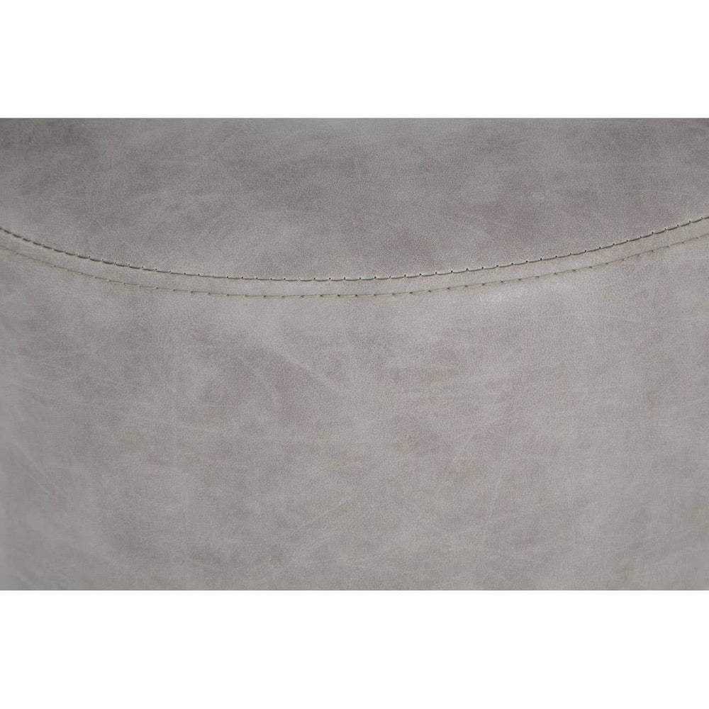 Ash grey faux leather pouffe with a smooth, textured surface and rounded edges, designed for versatile home decor use