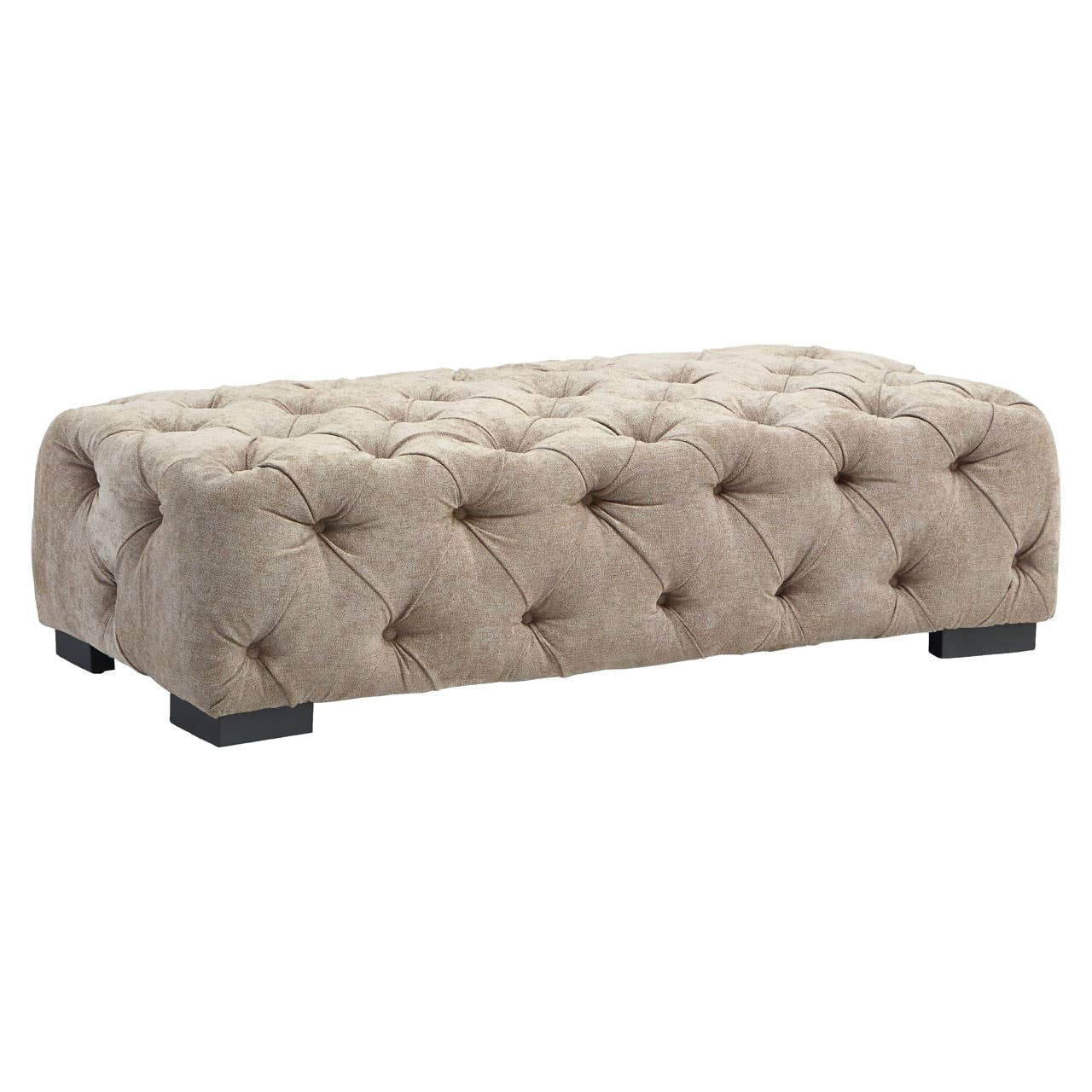 Rectangular footstool upholstered in natural fabric with tufted detailing, featuring a soft, cushioned surface and sturdy black legs