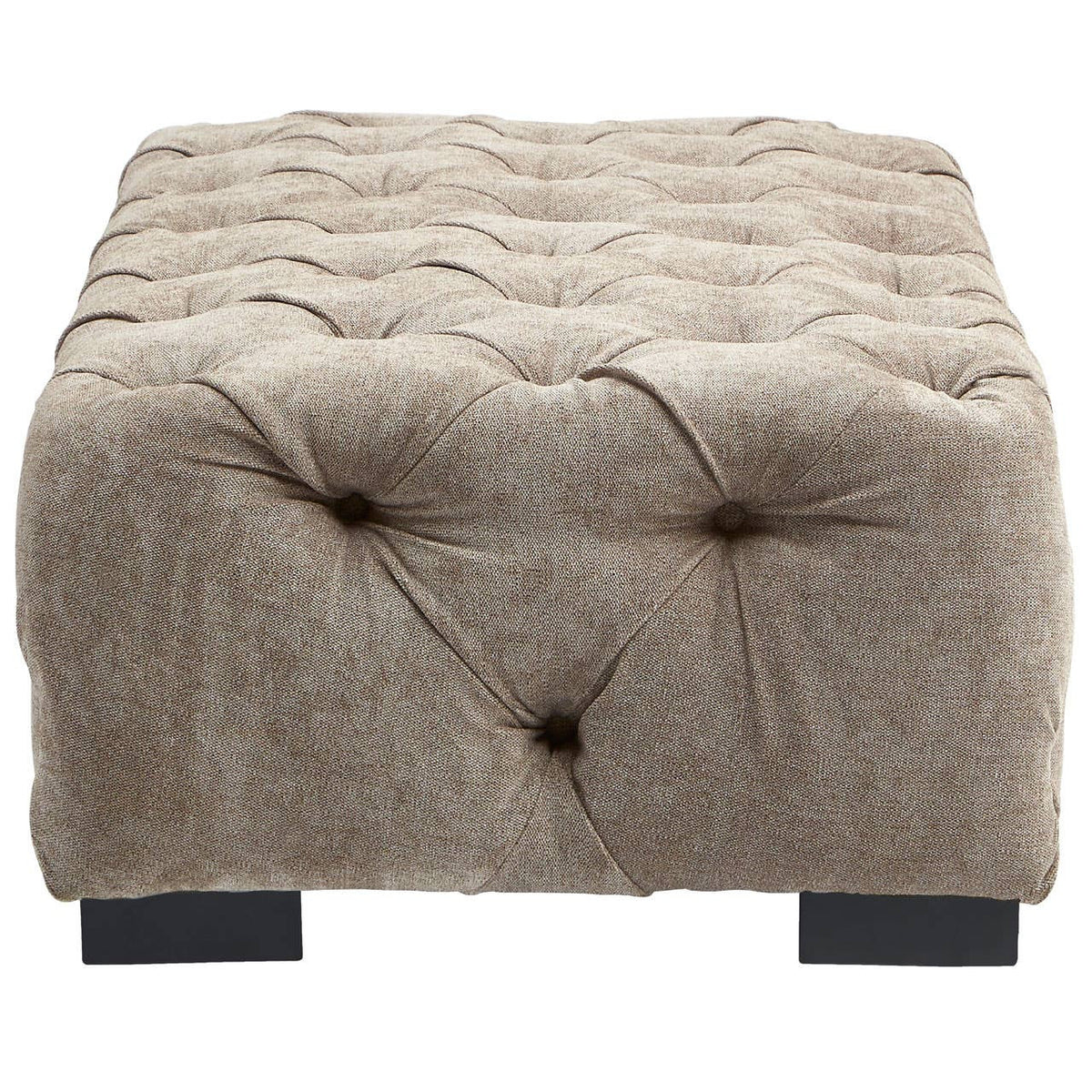 Rectangular footstool upholstered in natural fabric with a tufted design, featuring a soft, textured surface and four dark wooden legs. The footstool has a neutral beige color that complements various decor styles