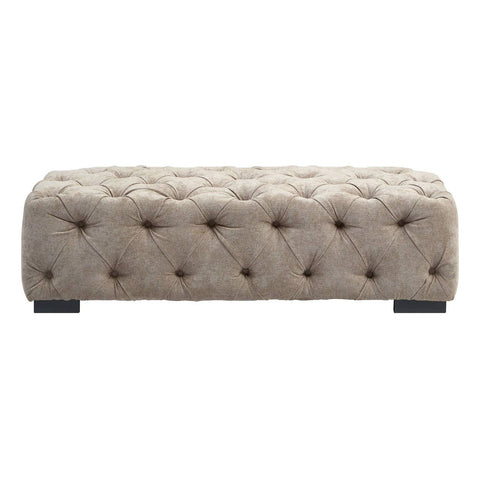 Rectangular footstool upholstered in natural fabric with tufted detailing and button accents, featuring a sturdy base and dark wooden legs