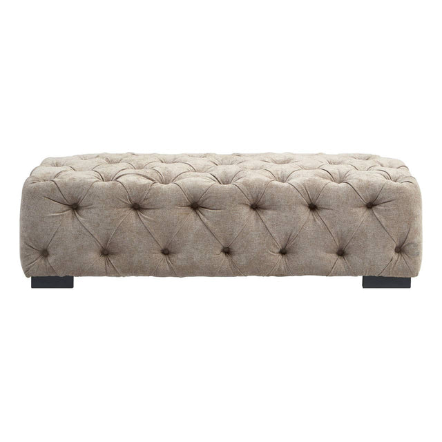 Rectangular footstool upholstered in natural fabric with tufted detailing and button accents, featuring a sturdy base and dark wooden legs