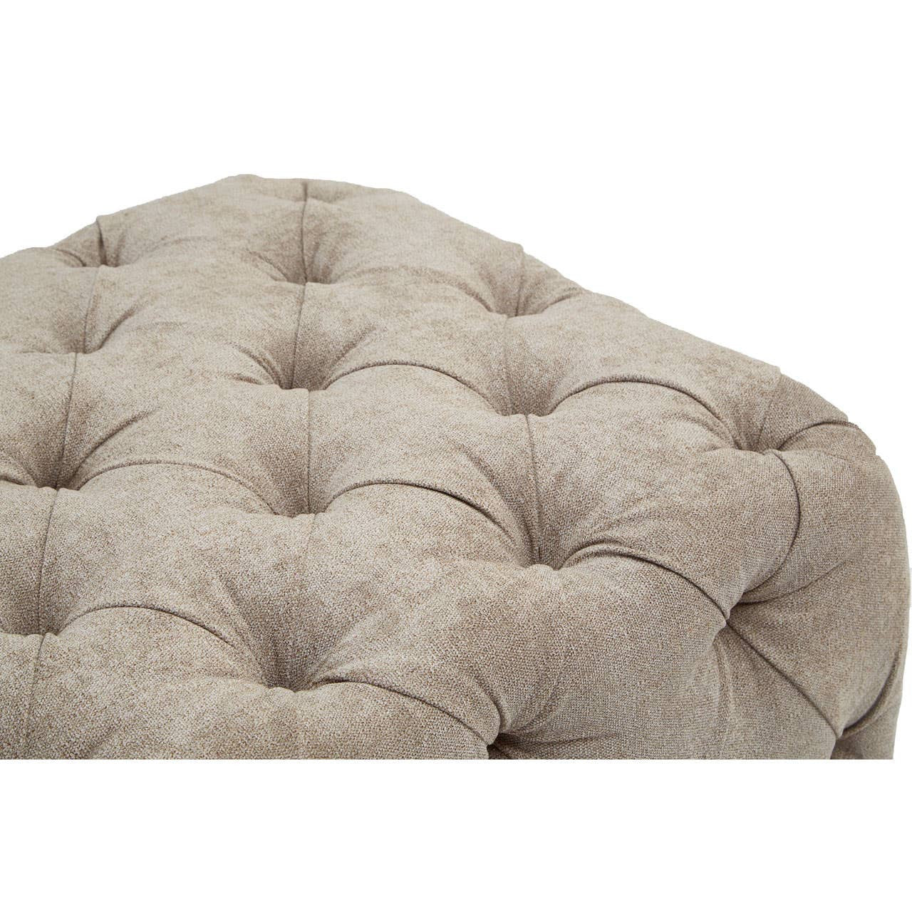 Rectangular footstool upholstered in natural fabric with a tufted design, featuring a soft, textured surface and rounded edges. The footstool is in a neutral beige color, showcasing deep button detailing for added elegance