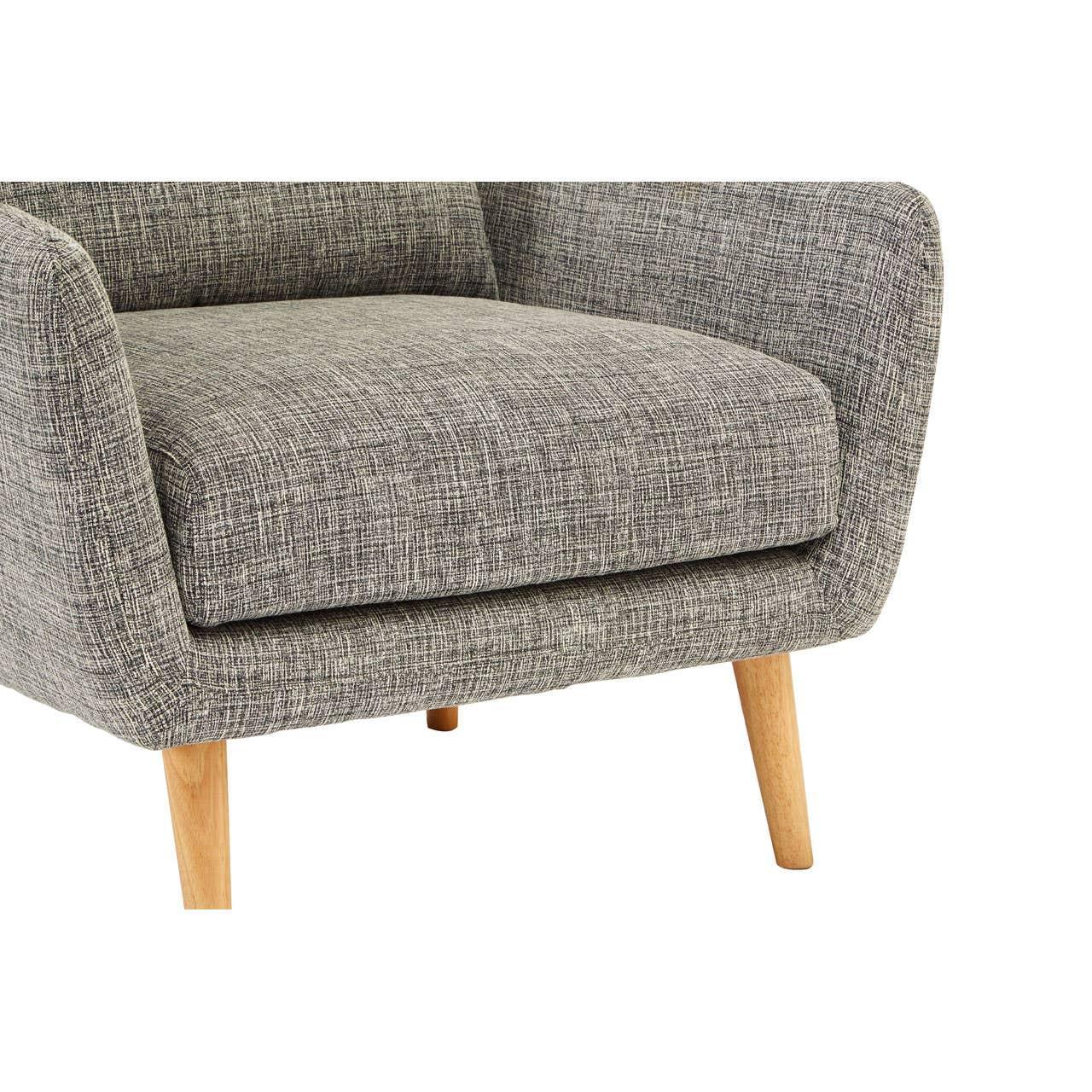 Grey fabric armchair with wooden legs, close-up view of seat and armrest