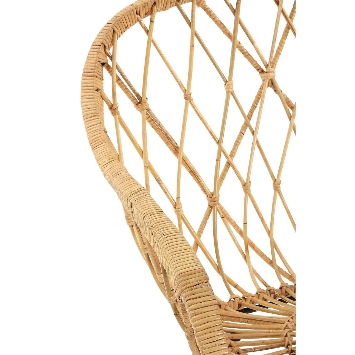Close-up of rattan chair backrest with woven lattice pattern in natural finish