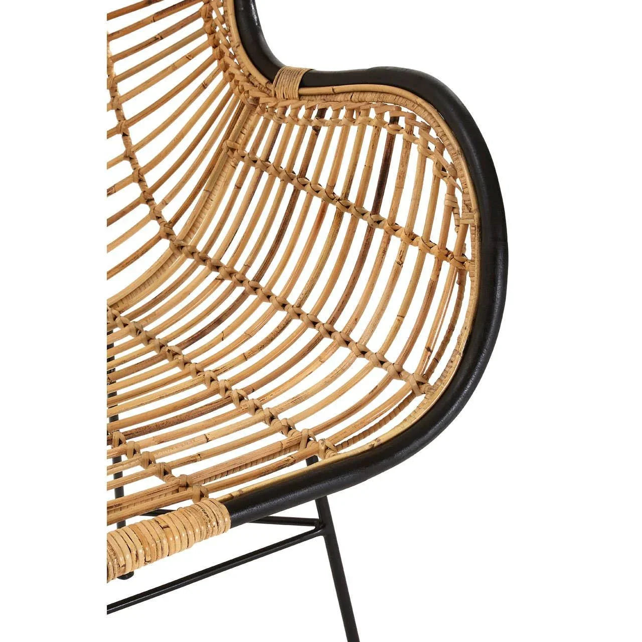 Curved rattan chair seat with black metal frame, close-up of woven design and support