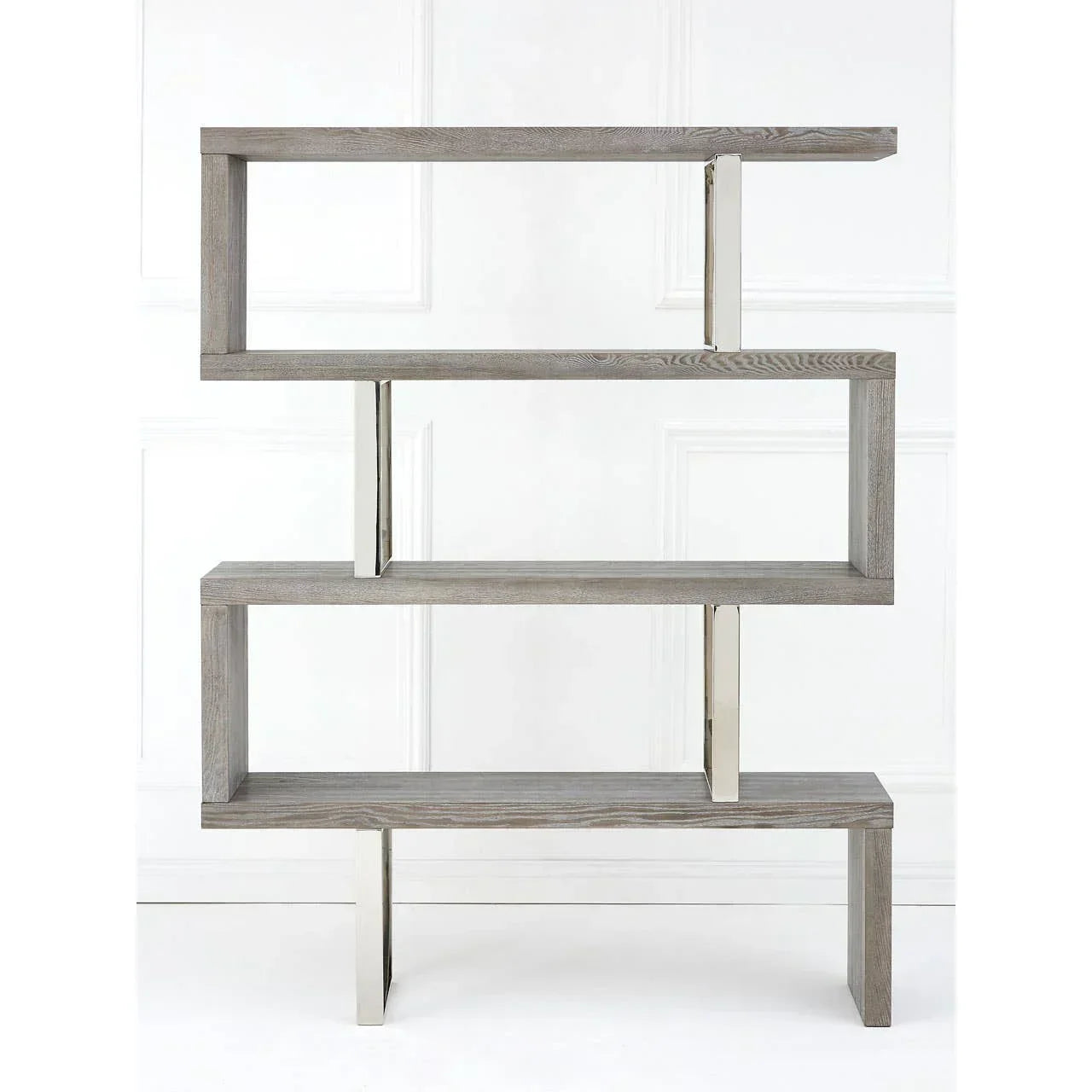Modern grey wood display shelf with open rectangular shelves and chrome accents against white wall