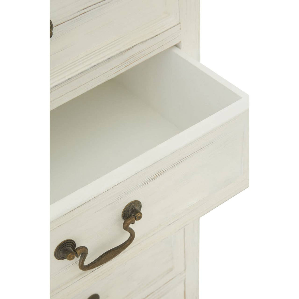 Close-up view of an open drawer from the Hendra Antique Style Chest of 7 Drawers, featuring a smooth white interior and a decorative metal handle. The surrounding wood has a distressed finish, showcasing an antique aesthetic