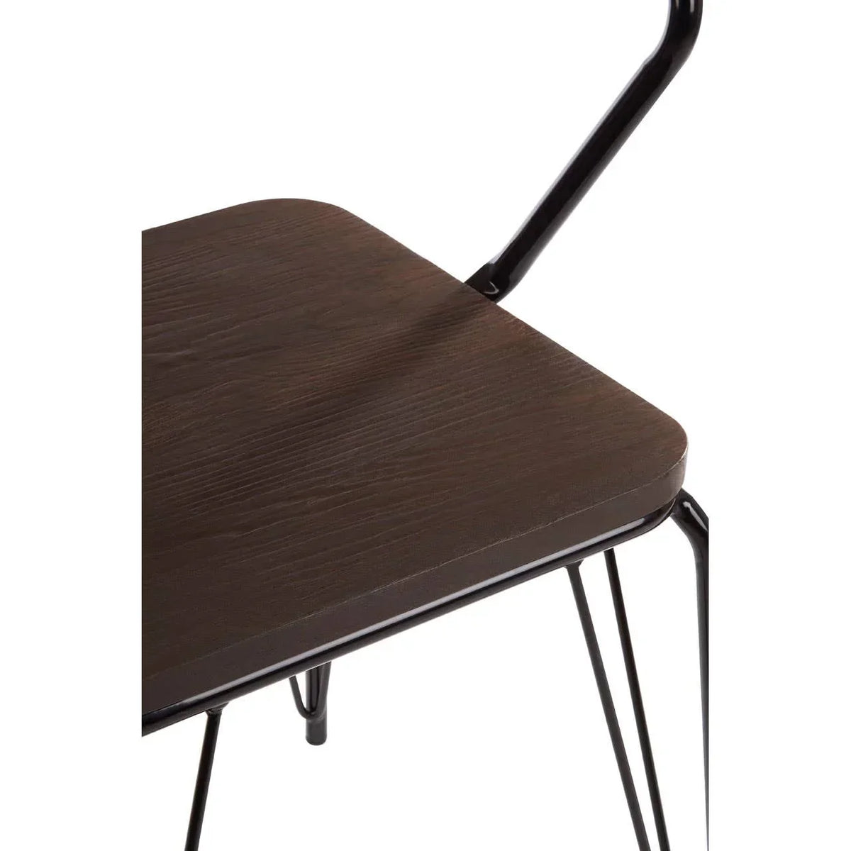 Closeup of dark wood dining chair seat with black metal legs and frame