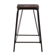 A tall stool featuring a black metal frame and a rectangular elm wood seat, designed with clean lines and a minimalist aesthetic. The stool has four slender legs and a footrest for added comfort