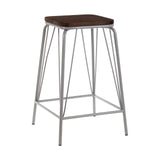 A tall stool featuring a square elm wood seat with a rich brown finish, supported by a sleek grey metal frame with four slender legs and a footrest for added comfort