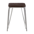 Small stool featuring a dark brown wood seat made of elm, supported by sleek grey metal legs with a modern design. The legs are angled and provide a sturdy base, while the overall look is minimalist and contemporary