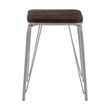 Small stool featuring a dark brown wood seat made of elm, supported by sleek grey metal legs with a modern design. The legs are angled and provide a sturdy base, while the overall look is minimalist and contemporary