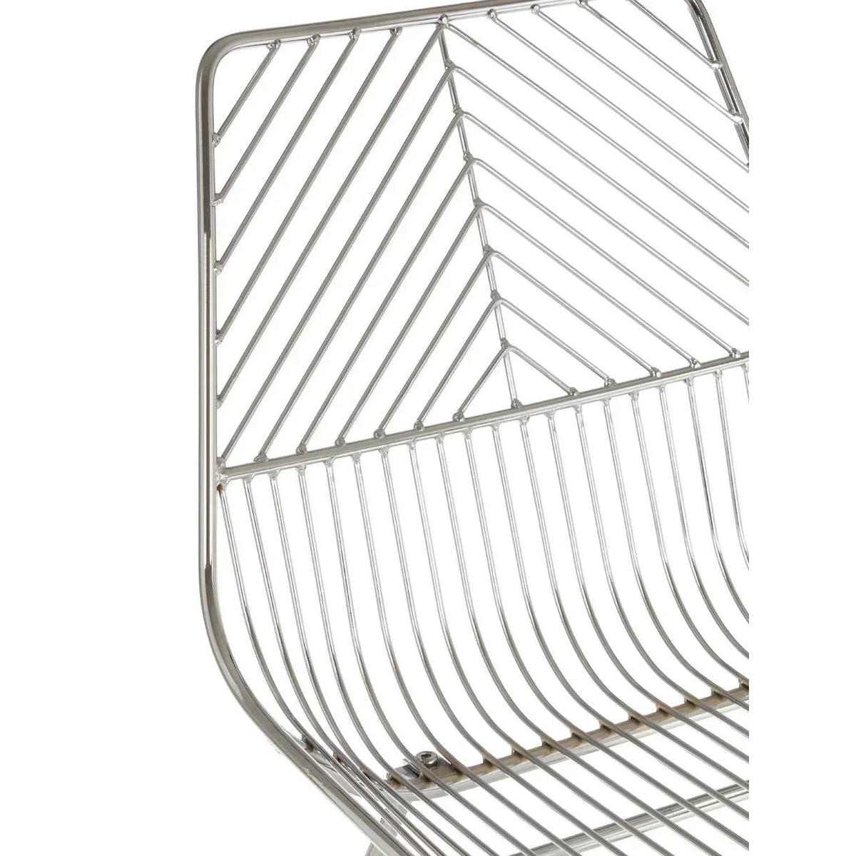 Chrome metal dining chair frame with chevron pattern backrest, close-up angle