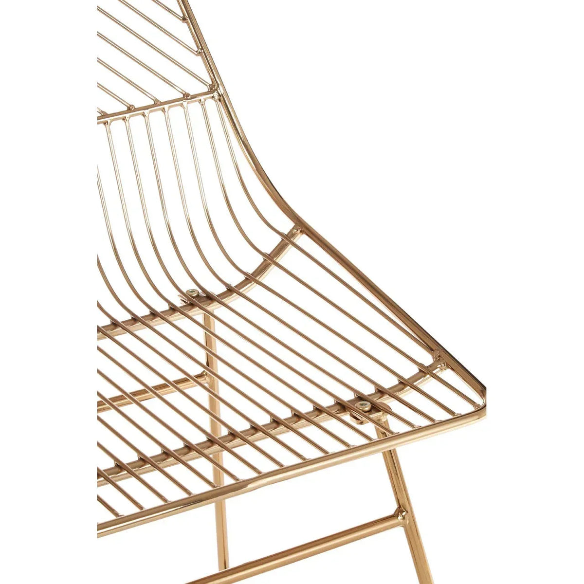 Gold metal dining chair frame with wire grid seat and angled lines closeup