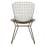 Bronze metal wire chair with a grid frame design, featuring a rounded backrest and armrests, supported by slender legs. The chair has a modern and minimalist aesthetic, suitable for various home decor styles