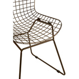 Bronze metal wire chair with a grid frame design, featuring a curved backrest and a minimalist structure supported by slender legs. The chair showcases an open, airy aesthetic suitable for modern home decor