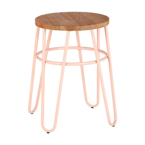 A hairpin stool featuring a round elm wood seat with a natural finish, supported by slender pink metal legs that create a modern and stylish look