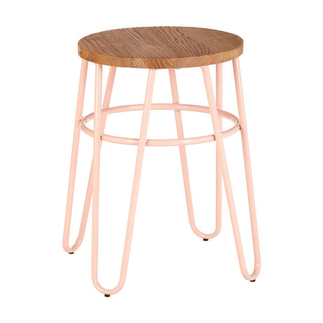 A hairpin stool featuring a round elm wood seat with a natural finish, supported by slender pink metal legs that create a modern and stylish look