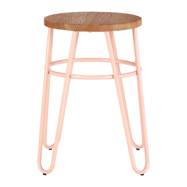 A hairpin stool featuring a round elm wood seat with a natural finish, supported by slender pink metal legs that create a modern and stylish look