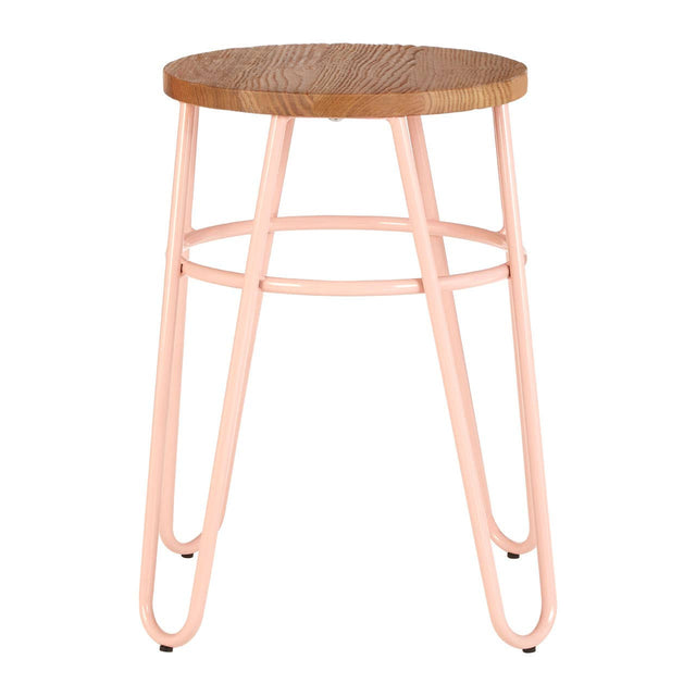 A hairpin stool featuring a round elm wood seat with a natural finish, supported by slender pink metal legs that create a modern and stylish look