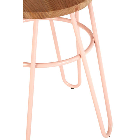 A pink metal hairpin stool featuring a round elm wood seat and slender hairpin legs, showcasing a modern design with a combination of soft pink and natural wood tones