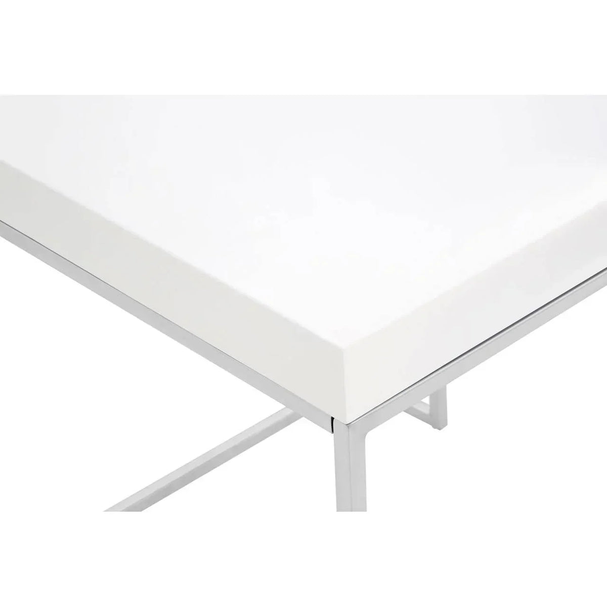 White table with metal legs, close-up of tabletop corner and frame detail