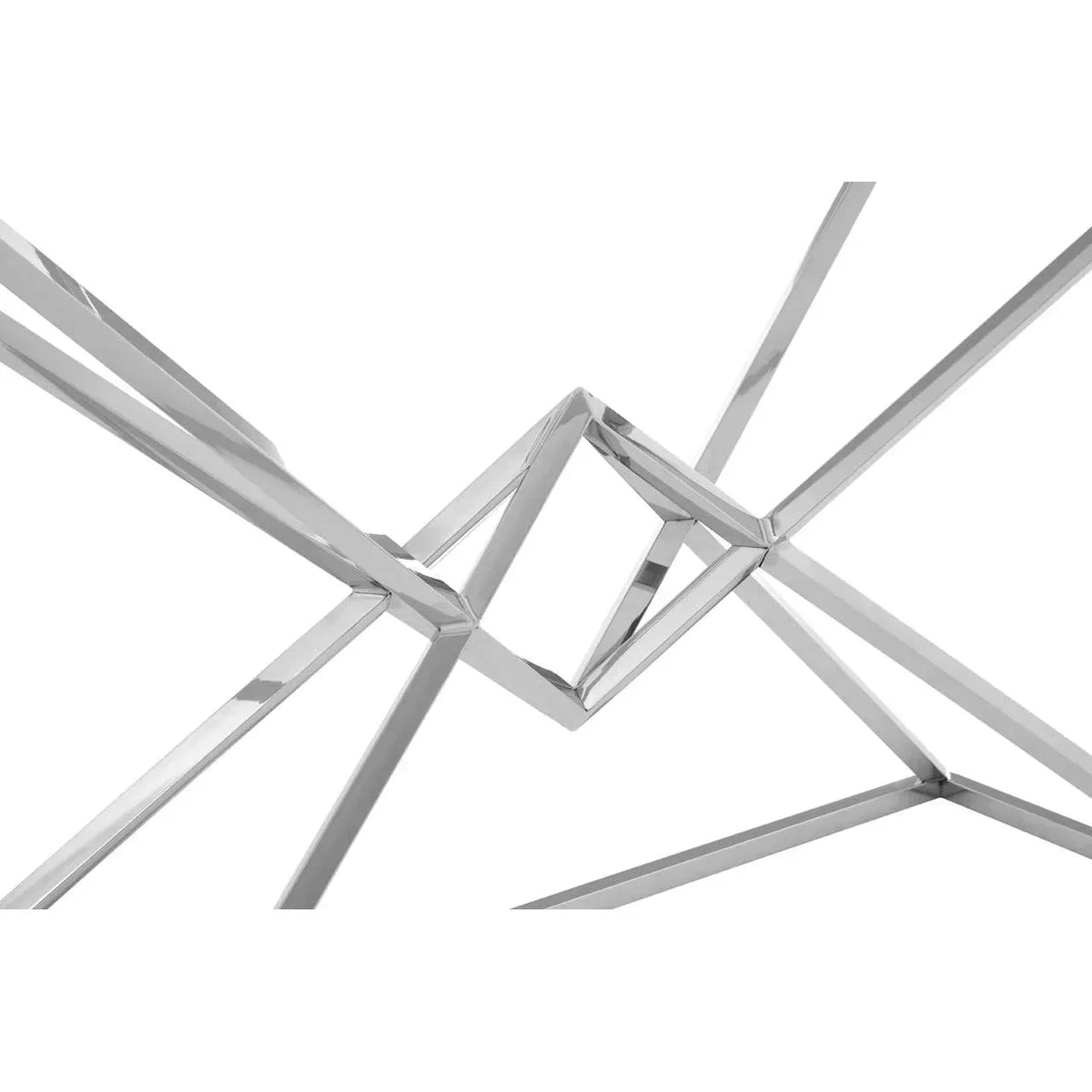 Close-up of polished metal coffee table legs with geometric intersecting design