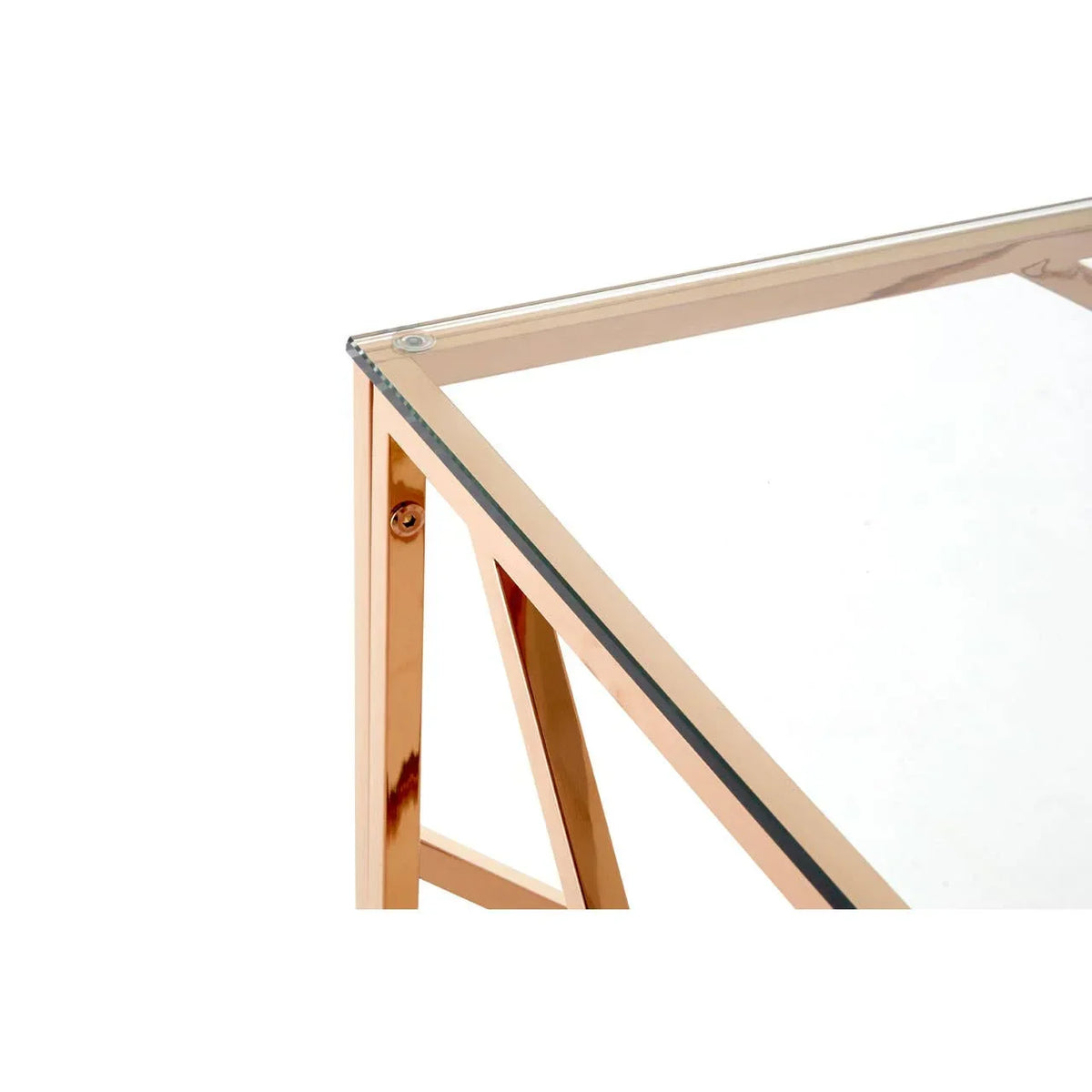 Glass top table with gold metal frame corner detail
