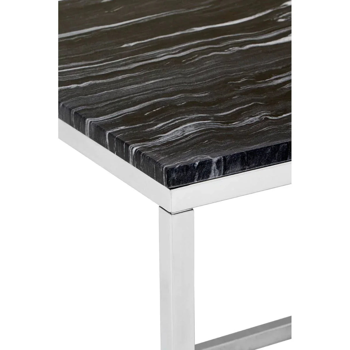 Black marble dining table corner with chrome metal legs and white veining detail