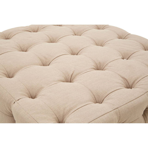 Beige linen stool featuring a button-tufted design with a soft, textured surface and rounded edges, ideal for adding a touch of elegance to home decor