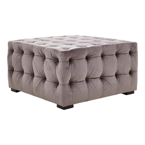 Square stool upholstered in soft grey velvet with button tufting, featuring a plush top and sturdy black legs