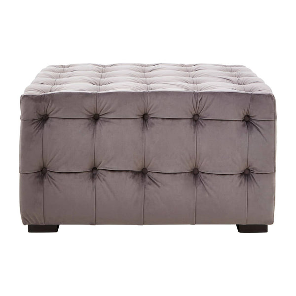 Grey velvet stool featuring a button-tufted design with a rectangular shape and dark wooden legs. The surface is plush and smooth, showcasing a sophisticated and modern aesthetic