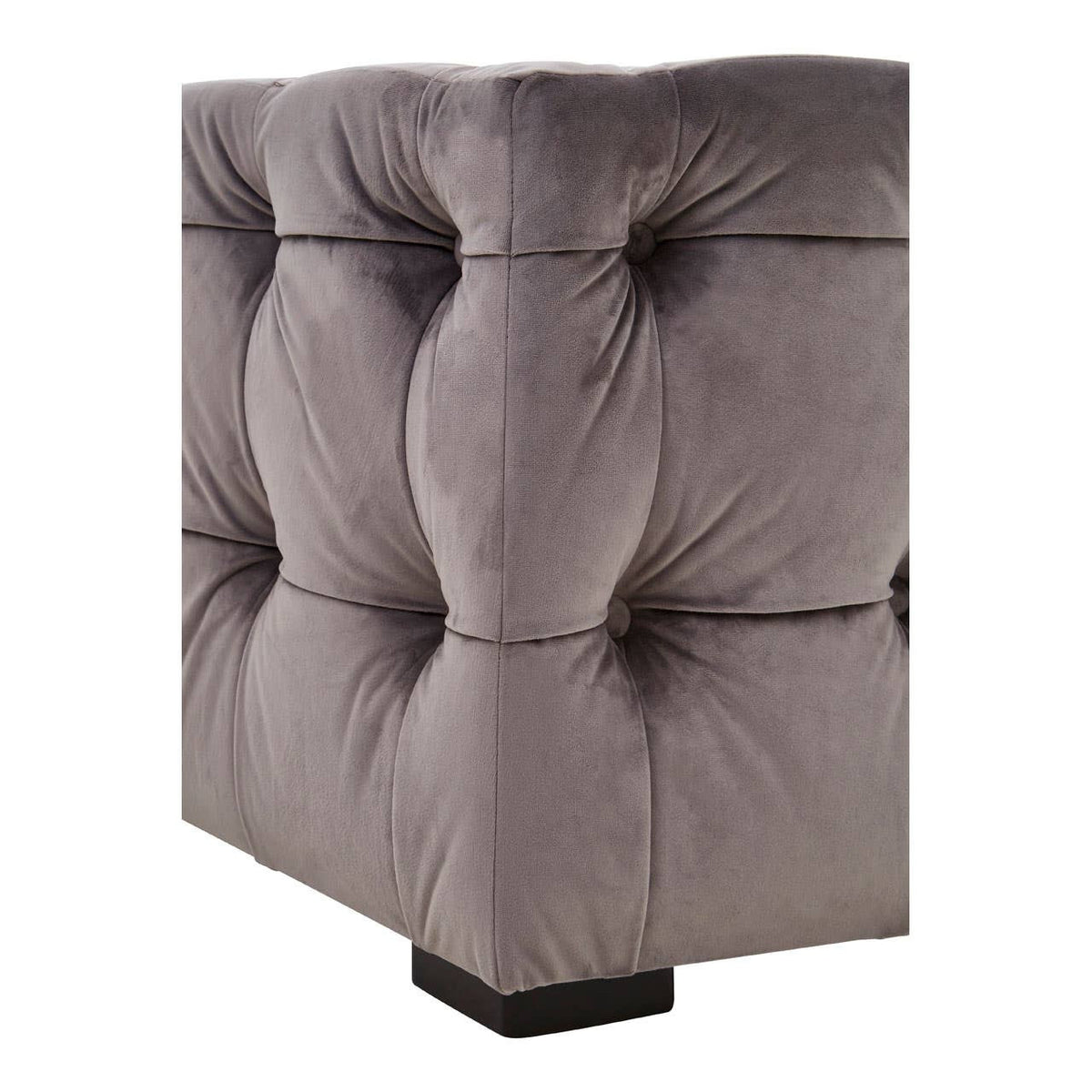 Grey velvet stool with a button-tufted design, featuring a square shape and a sturdy base. The fabric has a soft texture, and the tufting creates a plush, elegant appearance