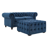 Midnight blue velvet button stool with a tufted design, featuring rounded edges and four wooden legs. The stool is positioned next to a matching tufted loveseat, creating a cohesive and elegant seating arrangement