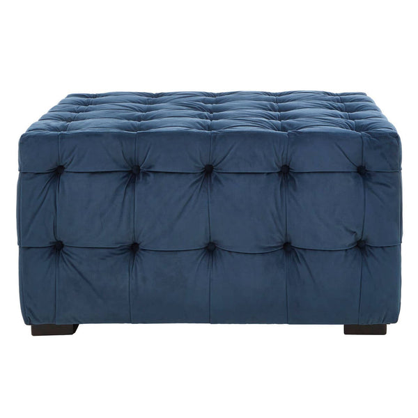 Midnight blue velvet button stool featuring a tufted design with multiple buttons, resting on dark wooden legs. The rectangular shape and plush upholstery add a touch of elegance to home decor
