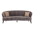 Three-seat sofa upholstered in grey velvet with a curved backrest and two contrasting beige throw pillows. The sofa features sleek wooden legs and a modern design, suitable for contemporary living spaces