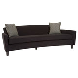 Three-seat sofa upholstered in black dimity fabric, featuring a curved backrest and tapered wooden legs. Two decorative cushions in a complementary color are placed at each end of the sofa. The overall design is modern and sleek, suitable for contemporary home decor