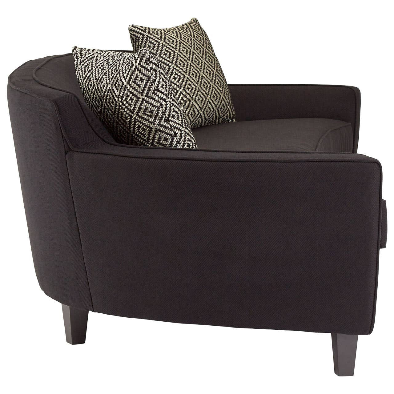 Three-seat sofa upholstered in black dimity fabric, featuring a sleek, modern design with rounded edges. The sofa has tapered wooden legs and comes with two decorative cushions in a contrasting pattern. The overall look is stylish and contemporary, suitable for various living spaces