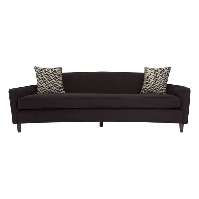 Three-seat sofa upholstered in black dimity fabric, featuring a sleek, curved backrest and two decorative cushions in a complementary color. The sofa stands on four tapered wooden legs, showcasing a modern design suitable for various living spaces